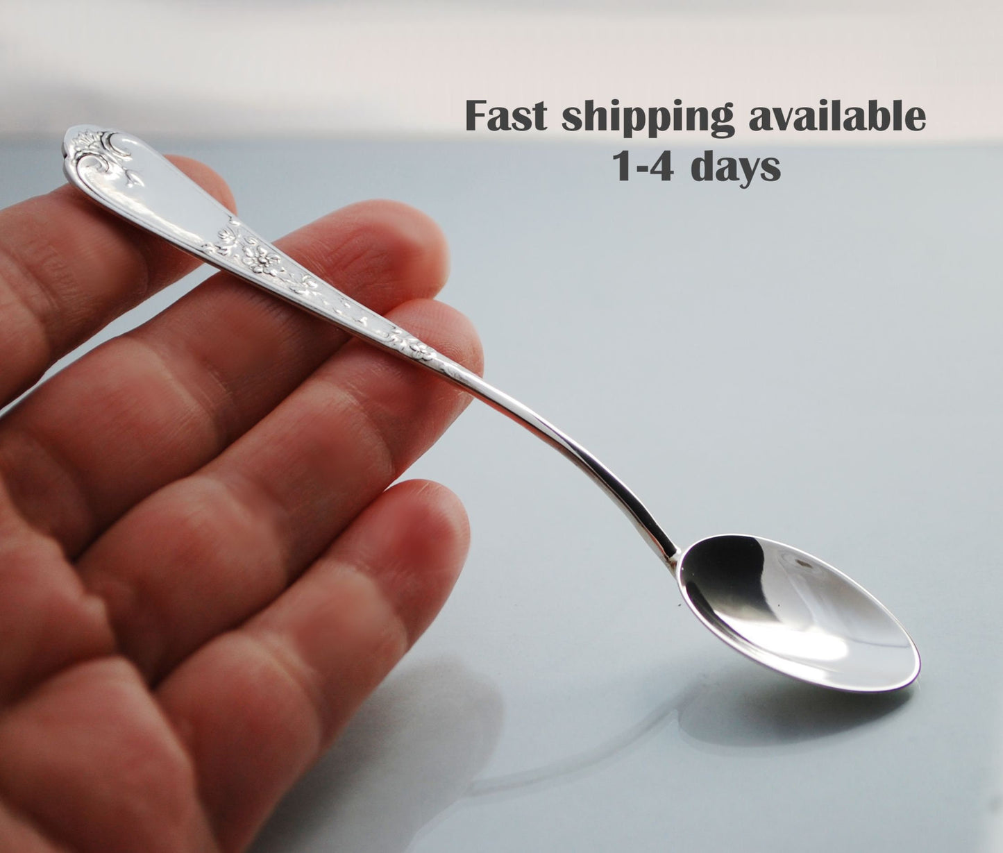 Sterling silver spoon .925 with elegant country style handle